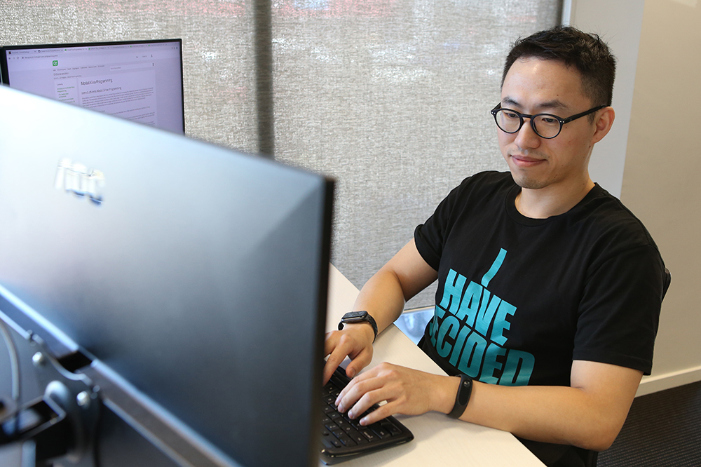 Oscar working at his desk