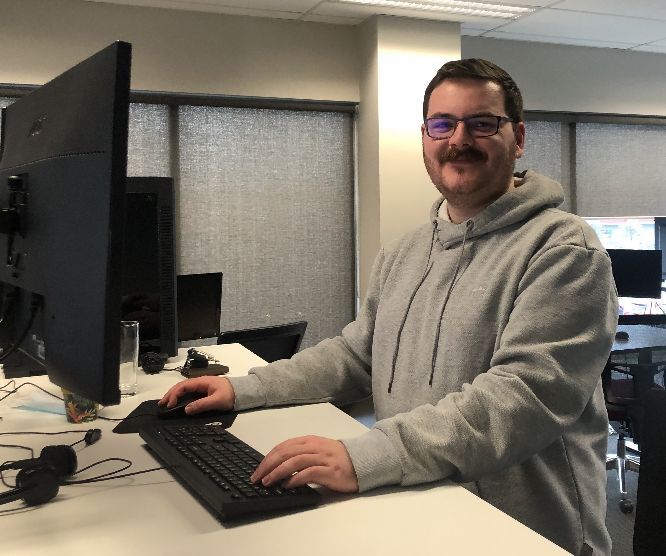 Ben working at his desk